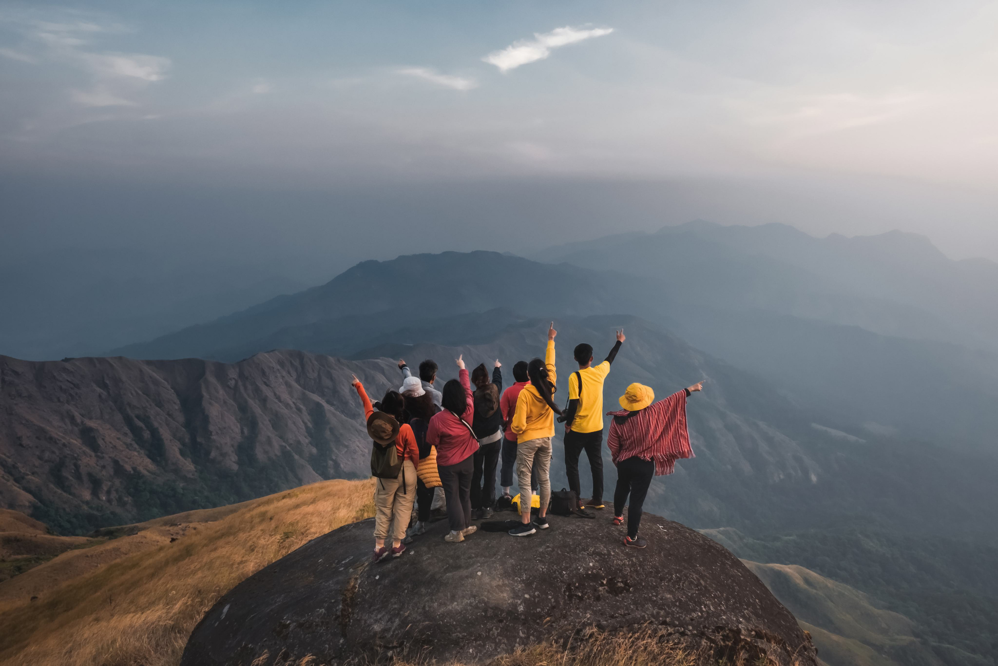 A group of travellers on a mountain ridge